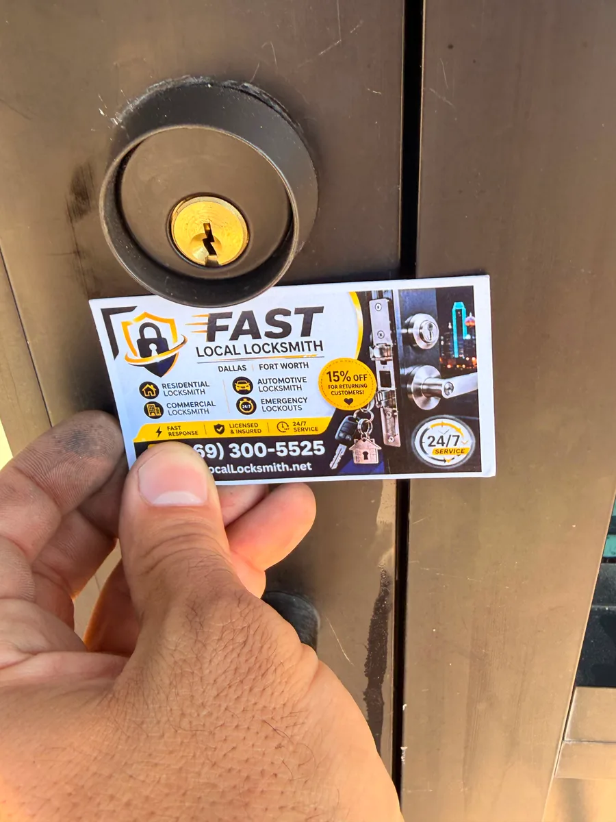 Fast Local Locksmith technician rekeying a residential door lock in Dallas