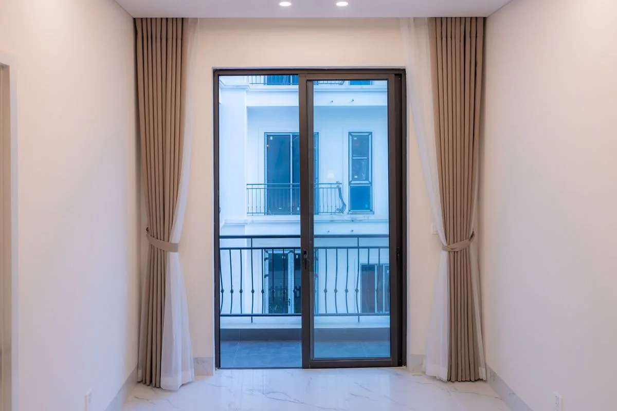 A large sliding glass door in a modern room